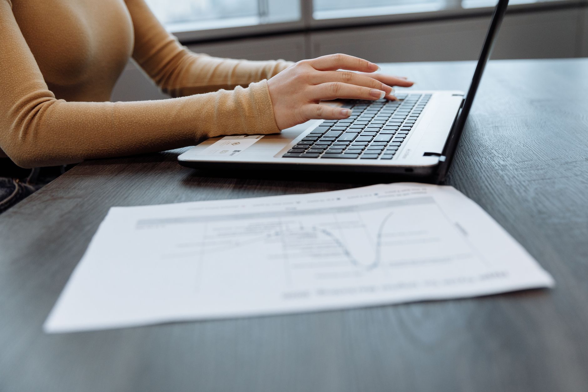 Employee reviewing payslip affected by HMRC PAYE tax code changes UK