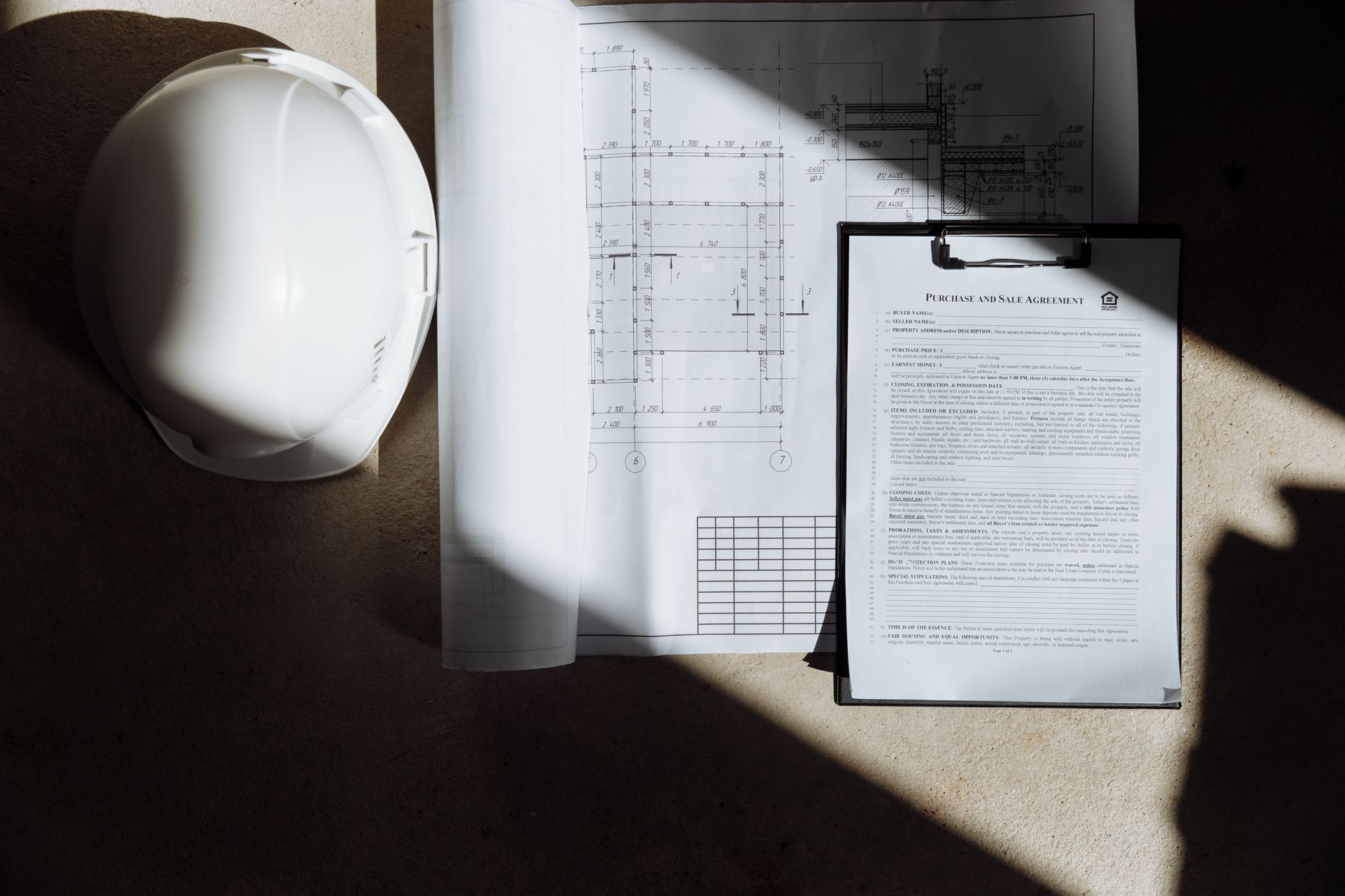 Planning permission documents on a desk representing the UK planning reform new homes 2026 approval process